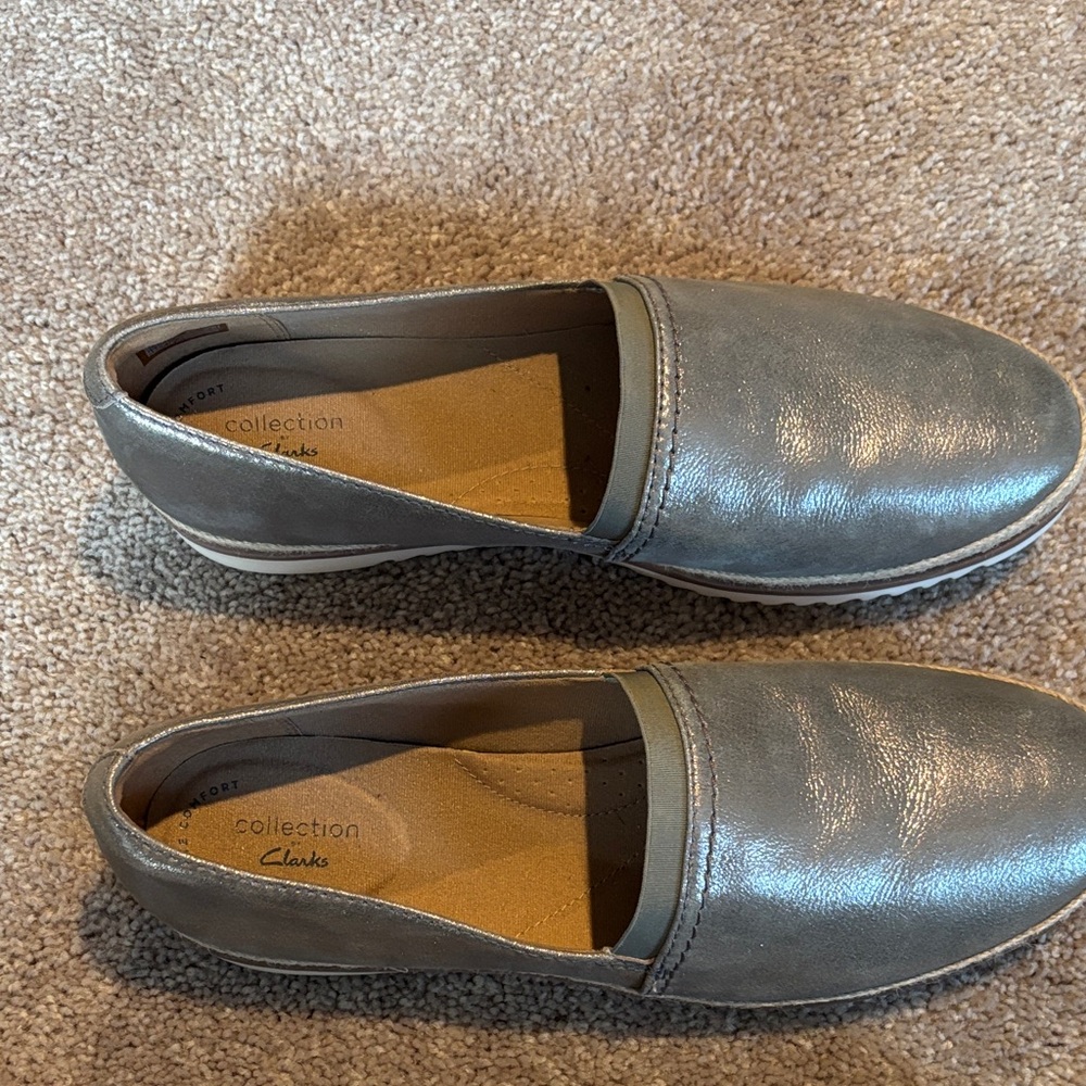 Clarks Women’s gray Slip-On Shoes